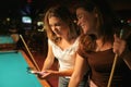 Texting at the pool hall Royalty Free Stock Photo