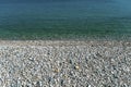 Textura of water and stones on the beach