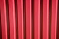 Textured background of red corrugated metal sheet or profile panel. Royalty Free Stock Photo