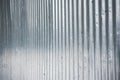 Textural background of gray corrugated metal sheet or profiled panel. Royalty Free Stock Photo