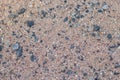 Textural background. A lot of wet Small stones and sand on the beach. Naturally rounded gravel at sea shore, nature beach Royalty Free Stock Photo