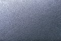 Textural of silver background of wavy corrugated paper, closeup Royalty Free Stock Photo