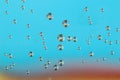 Texture of air bubbles in water on blue and red backroud Royalty Free Stock Photo