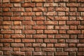 Texture of aged red brick wall with cracked weathered structure close-up Royalty Free Stock Photo