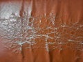 Texture of an aged wrecked brown leather couch Royalty Free Stock Photo