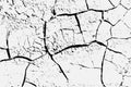 Texture of arid ground cracks and splashes of stains, black and white texture background EPS vector Royalty Free Stock Photo