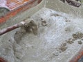 Texture and background abstract picture of mixed cement with tools for building the brick wall at the construction site. Royalty Free Stock Photo