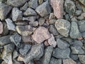 texture and background of colored stones on the river bank in the daytime Royalty Free Stock Photo