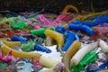 Texture and background of colorful candles that had burned as a result of worship floated in a tub of water.