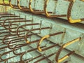 Texture, background. concrete block with rusty rebar sticking out inside. fasteners for the construction of concrete high houses.