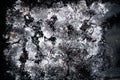 Texture background from icing sugar, crushed cookies and chocolate on a black stoun slate. Cook at home Royalty Free Stock Photo