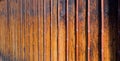 Background image of the old wooden wall and bamboo to build