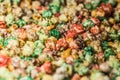 Texture background of multi-colored caramel popcorn. Close-up. Royalty Free Stock Photo