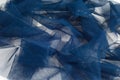 Texture, background, pattern. Blue ribbon in a small grid. Wide Royalty Free Stock Photo