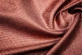 Texture, background, pattern. Cloth with burgundy coating with metallic gold thread. These fabrics are ideal for any project, Royalty Free Stock Photo