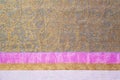 Texture, background, pattern. Combined silk white fabric and gold and silver damask fabric, pink ribbons Royalty Free Stock Photo