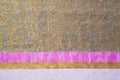 Texture, background, pattern. Combined silk white fabric and gold and silver damask fabric, pink ribbons Royalty Free Stock Photo