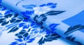 Texture, background, pattern, delicate blue silk with floral print Exceptionally lightweight pure silk fabric with a delicate