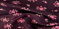 Texture, background, pattern. Fabric dark cherry color With smal Royalty Free Stock Photo