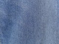 texture, background, pattern. the fabric of a denim. blue denim jeans fabric with a small pattern Royalty Free Stock Photo