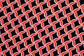 Texture, background, pattern. Fabric drawing of a diamond diamond red on a black background Royalty Free Stock Photo
