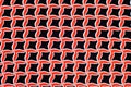 Texture, background, pattern. Fabric drawing of a diamond diamond red on a black background Royalty Free Stock Photo