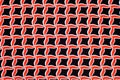 Texture, background, pattern. Fabric drawing of a diamond diamond red on a black background