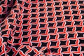 Texture, background, pattern. Fabric drawing of a diamond diamond red on a black background Royalty Free Stock Photo