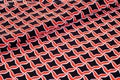 Texture, background, pattern. Fabric drawing of a diamond diamond red on a black background Royalty Free Stock Photo