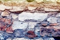 Texture, background, pattern. Granite stone. Texture of gray granite. Outside wall of uneven stones. White and pale red stones. T Royalty Free Stock Photo