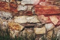 Texture, background, pattern. Granite stone. Texture of gray granite. Outside wall of uneven stones. White and pale red stones. T Royalty Free Stock Photo