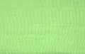 Texture, background, pattern, green silk corrugation crushed fabric for your projects Royalty Free Stock Photo