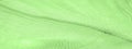 Texture, background, pattern, green silk corrugation crushed fabric for your projects Royalty Free Stock Photo