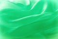 Texture, background, pattern. Green silk fabric for draping. Abs Royalty Free Stock Photo
