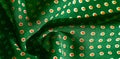 Texture background, pattern, green silk fabric with red polka dots. Light and silky-soft satin pendant is perfect for your design