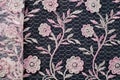 Texture, background, pattern. Pink lace decorated with flowers o Royalty Free Stock Photo