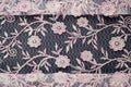 Texture, background, pattern. Pink lace decorated with flowers o Royalty Free Stock Photo