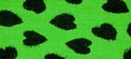 Texture, background, pattern, postcard, silk fabric, green print from the fabric of black hearts, your projects will not go Royalty Free Stock Photo