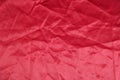 Texture, background, pattern. Red silk fabric.This satin fabric Royalty Free Stock Photo