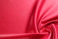 Texture, background, pattern. Red silk fabric.This satin fabric Royalty Free Stock Photo