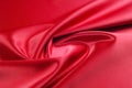 Texture, background, pattern. Red silk fabric.This satin fabric Royalty Free Stock Photo