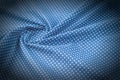 Texture background pattern. Silk fabric, blue cloth in white pea Royalty Free Stock Photo