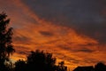 Texture, background, pattern. The sky is at sunset, dawn. Colored clouds, red, orange, pastel colors. Romantic pastel sky at dusk