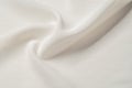 Texture background pattern. White silk fabric. Closeup of a rippled white silk fabric. Advertising space. Smooth elegant white si Royalty Free Stock Photo