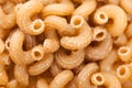 Texture background of raw italian pasta fusilli macaroni made of Royalty Free Stock Photo