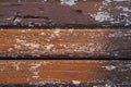 Texture background of rows of wood which coated with brown color lacquer painting, have several damage spots on the surface