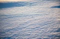 Texture and background of snow-covered surface.Sparkling snow illuminated by sunlight.