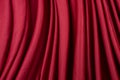 Texture, background, template. Silk fabric. Red silk drapery and upholstery fabric. Solid fabrics for backdrop, drapes, flags