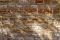 Texture background of a 19th century stone brick wall with restored mortar