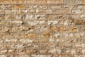 Texture background of a 19th century stone brick wall with restored mortar